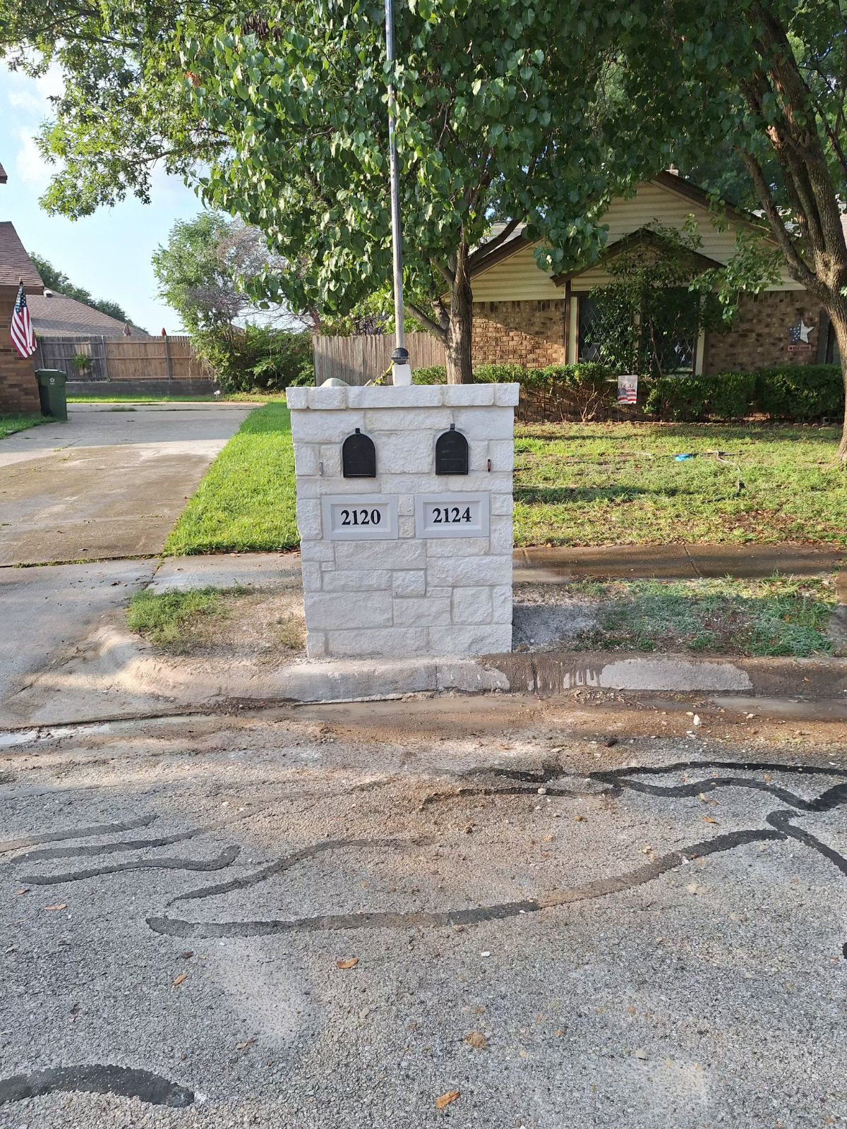 Stone dual mailbox construction in Fort Worth – custom masonry work for neighborhood entrance by expert contractors in Tarrant County